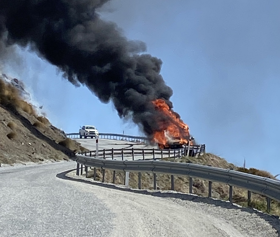 The vehicle on fire on the Remarkables Ski Area access road. Photo: Sean Parnell