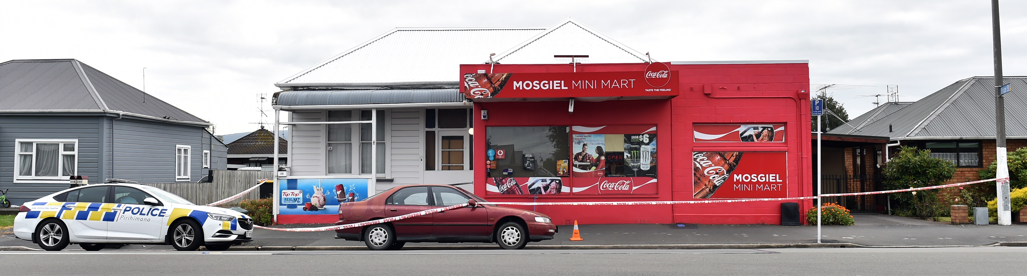 Officers are at the Mini Mart today to complete a scene examination. PHOTO: PETER MCINTOSH