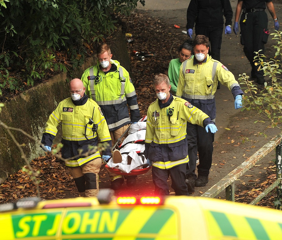 Emergency services carry an injured party-goer in a Stokes basket after an accident at a St...