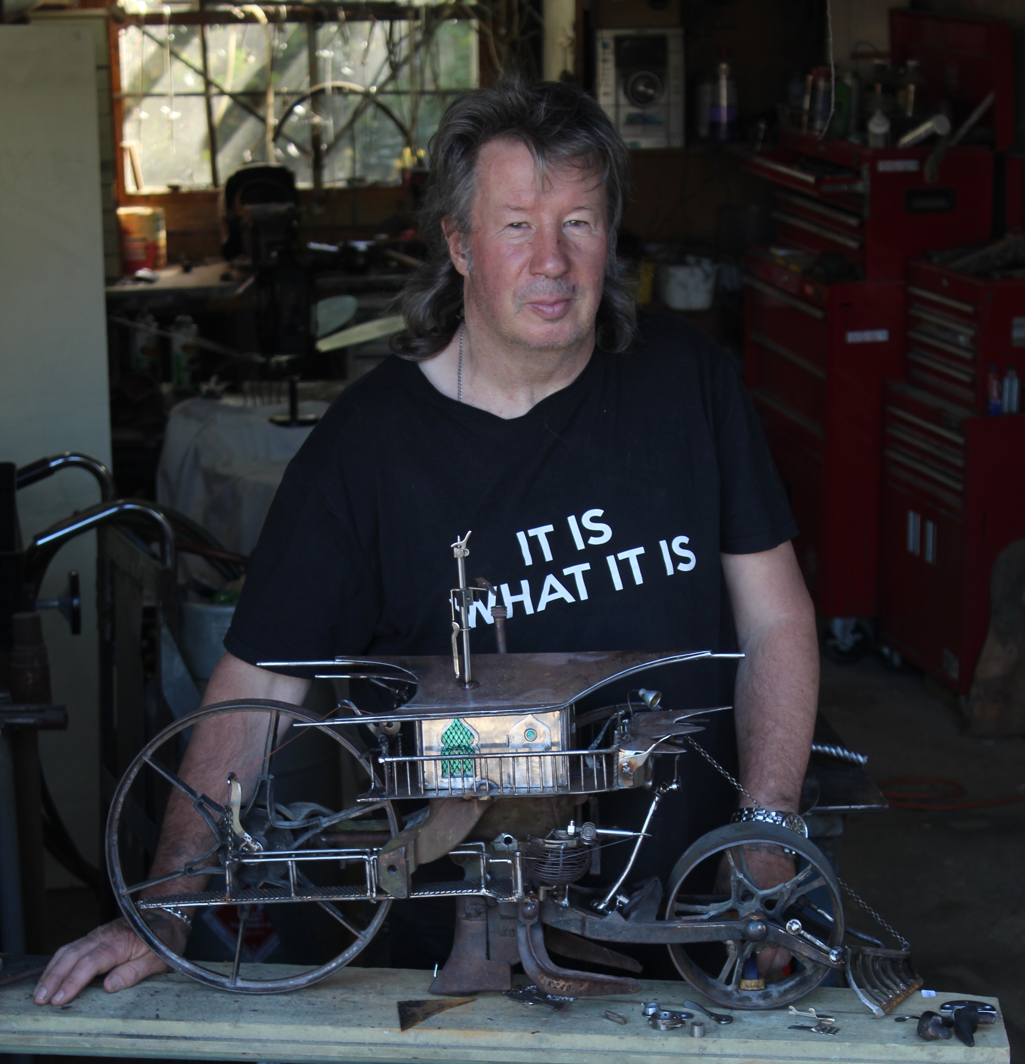 Dark artist ... Inside Reg Whaley's garage found objects and metal are transformed into unique...