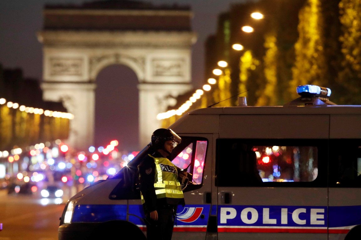 Police at the scene on the Champs Elysees after the incident. Photo Reuters
