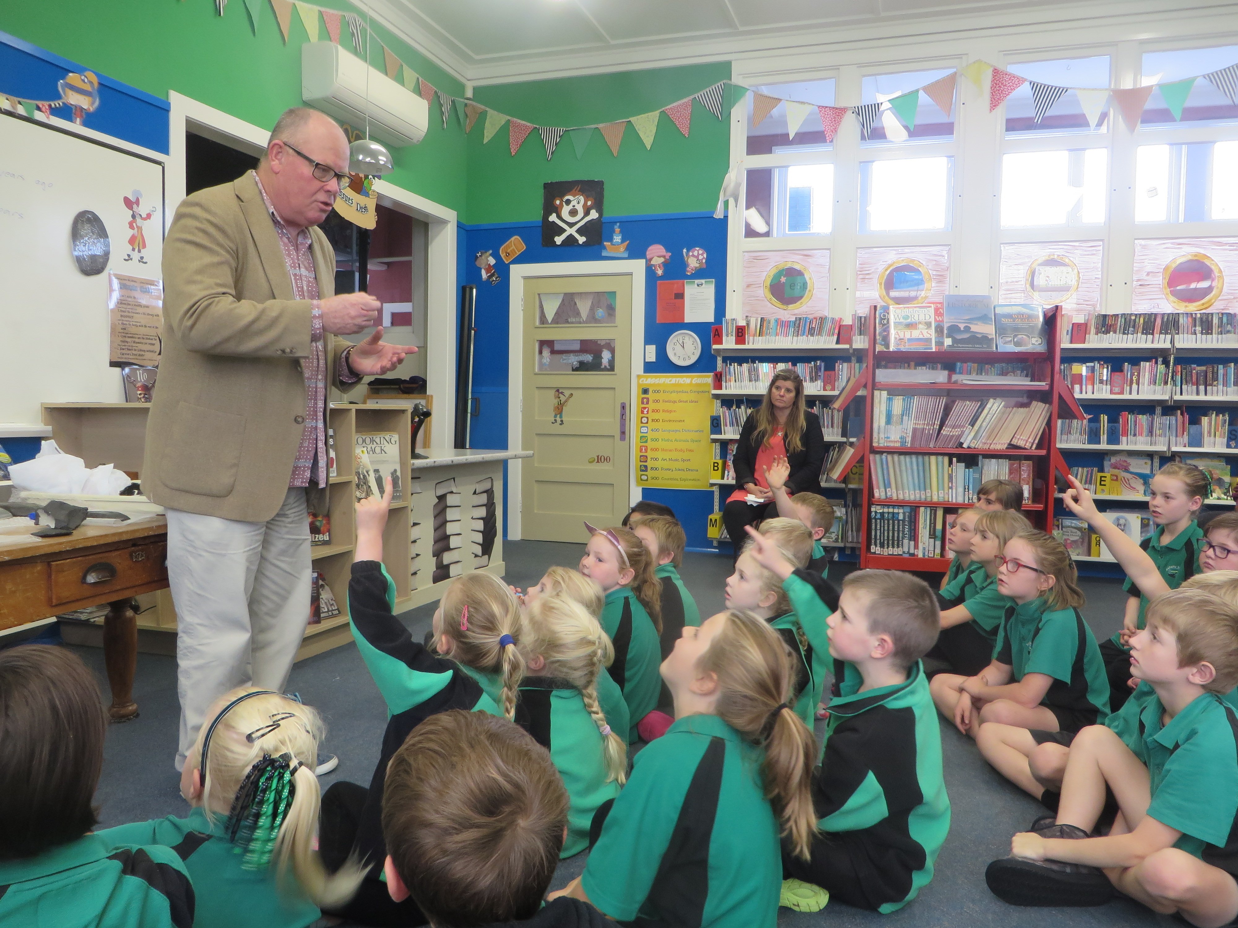 University of Otago  professor of archaeology Richard Walter talks to pupils at Maheno School...