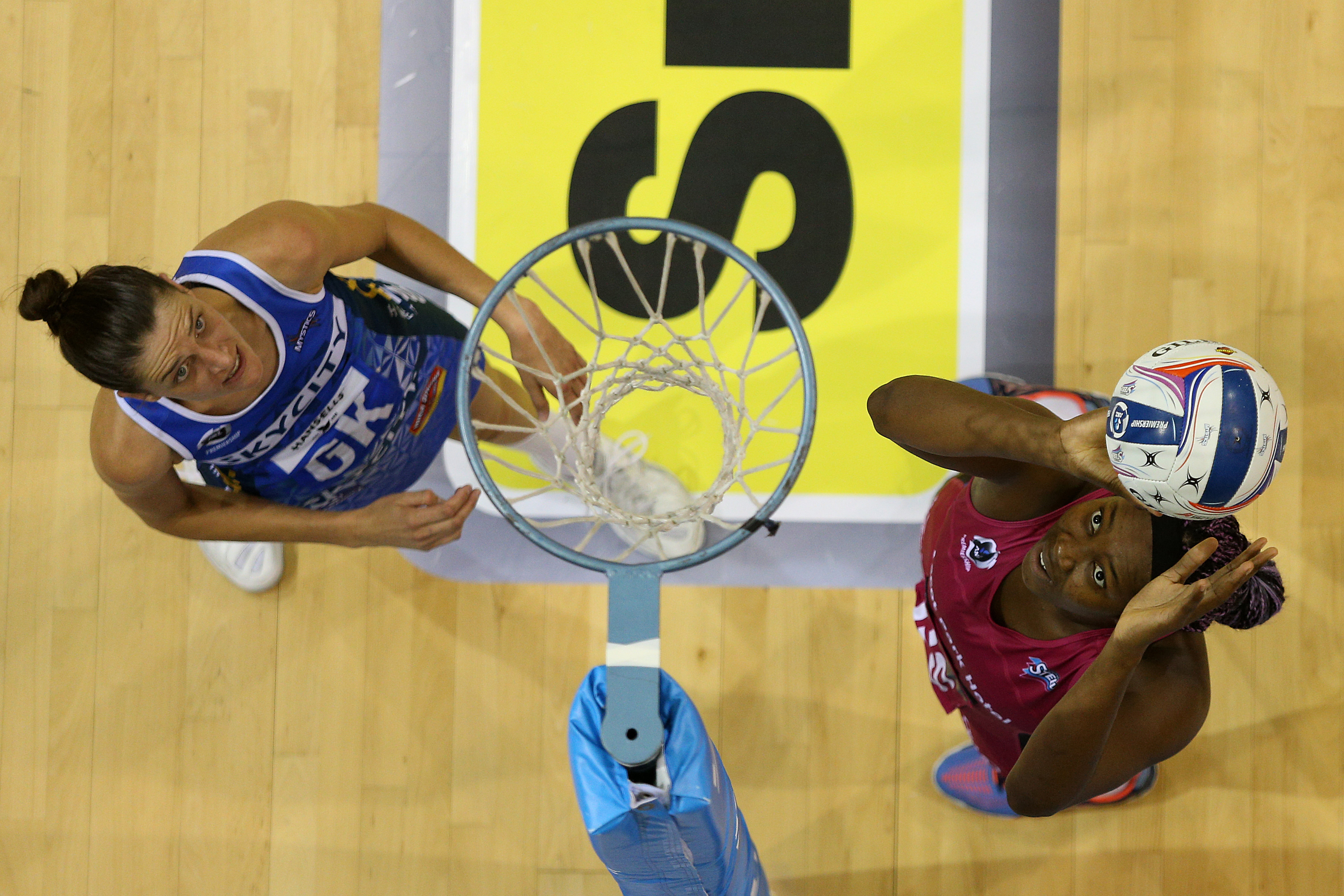 Southern Steel goal-shoot Jhaniele Fowler-Reid (right) lines up a shot as Mystics wing defence Anna Harrison looks on during the ANZ Premiership match at ILT Stadium Southland in Invercargill yesterday. Photo: Michael Bradley Photography.