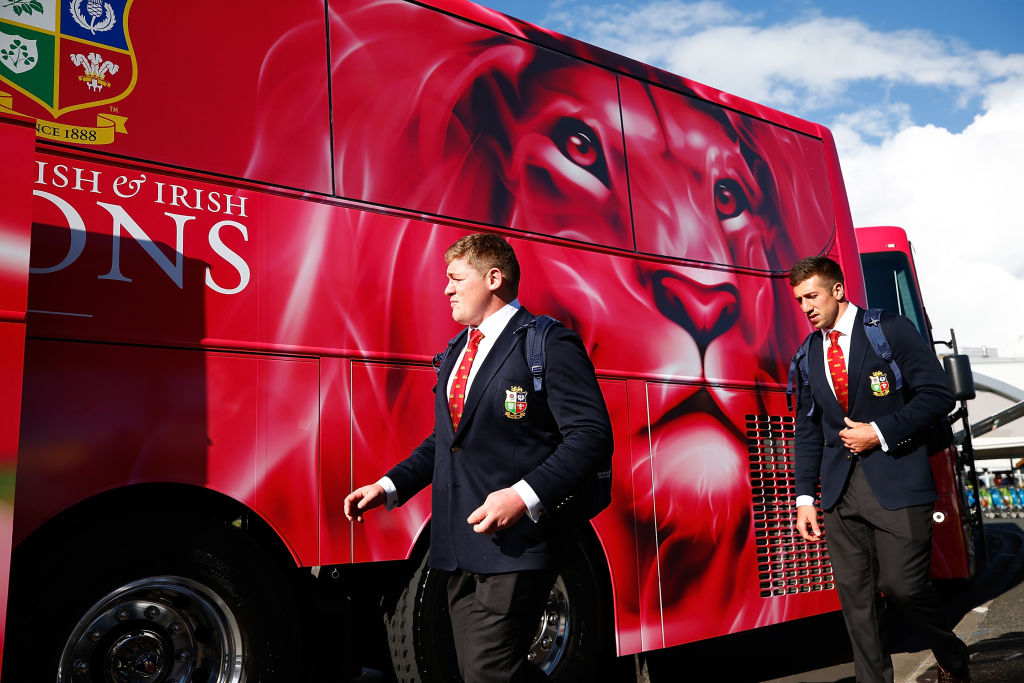 Lions players Tadhg Furlong (L) and Justin Tipuric by the team buses at Auckland International...