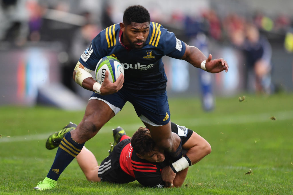 Waisake Naholo is caught while running the ball up for the Highlanders. Photo Getty