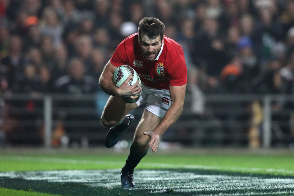 Jared Payne of the Lions goes over to score his team's third try. Photo: Getty