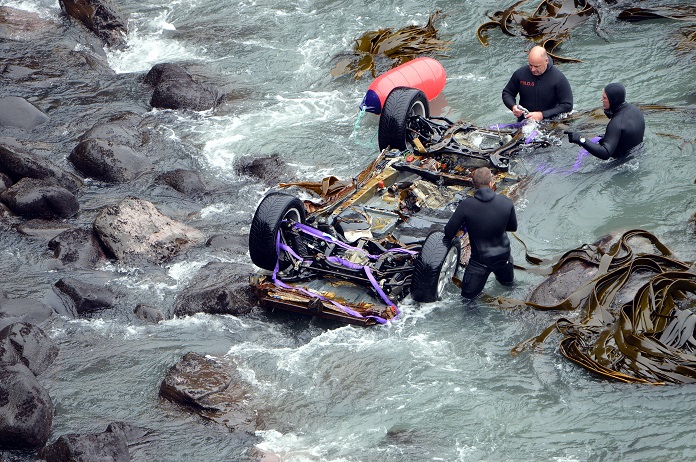 The Volkswagen Touareg belonging to John Beckenridge is recovered from the sea near Curio Bay in...