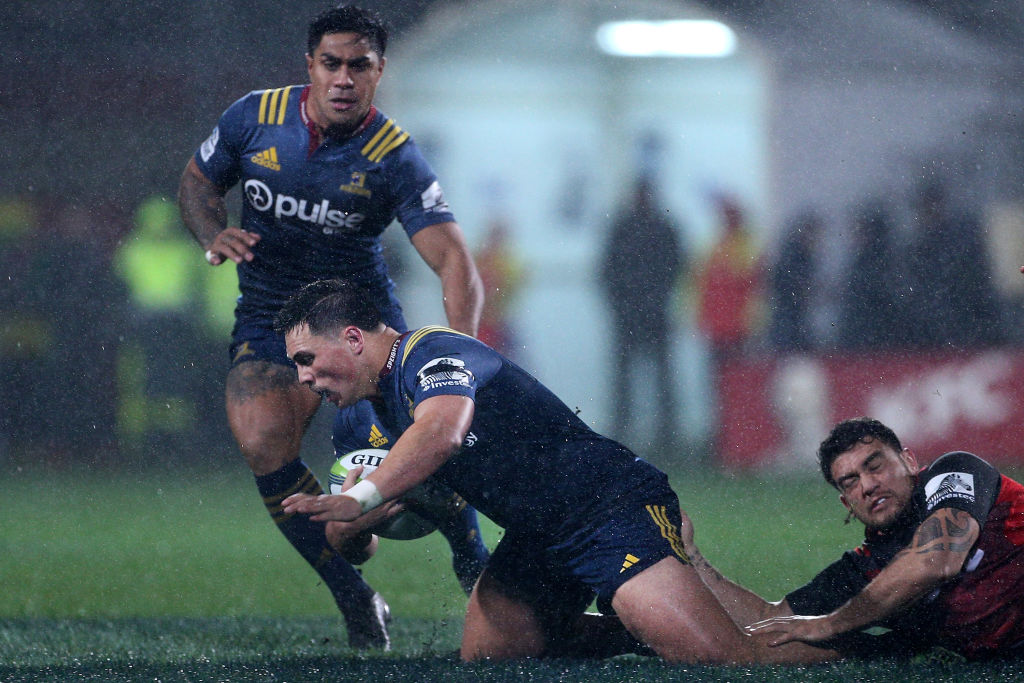 Daniel Lienert-Brown of the Highlanders tries to break through the defence. Photo: Getty