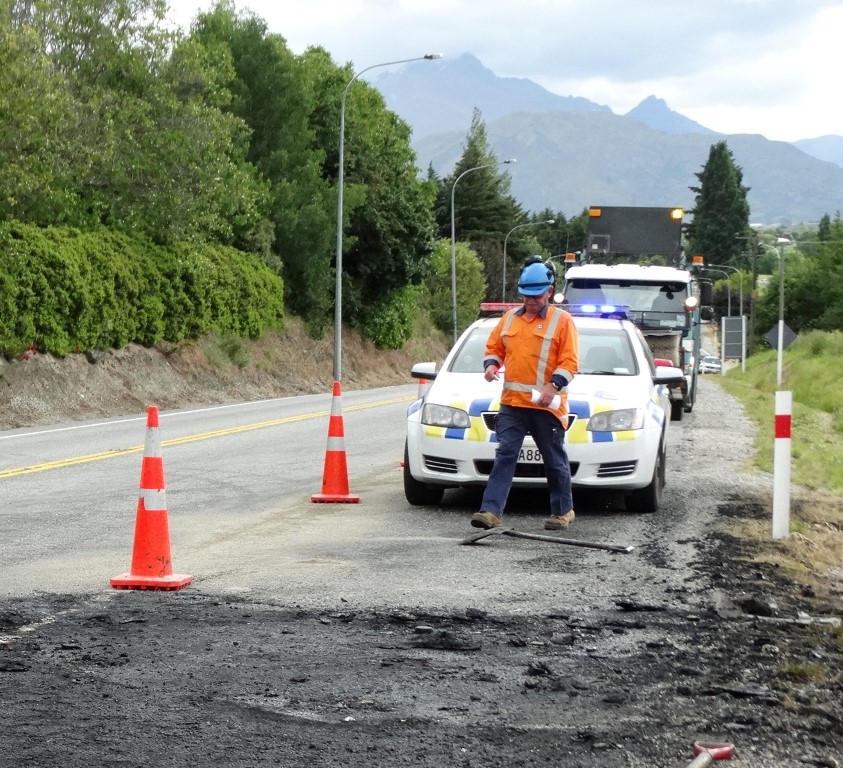 A damaged road surface on State Highway 6 near the Arrowtown-Lake Hayes Rd turnoff after a three...