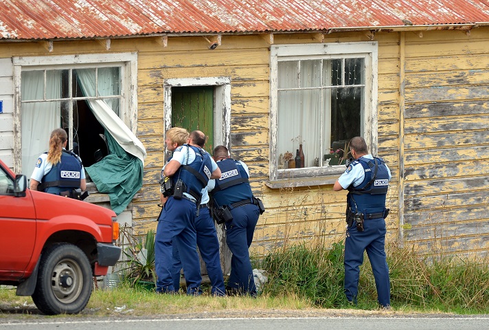 Police at the scene in Seacliff in March last year. Photo: Stephen Jaquiery