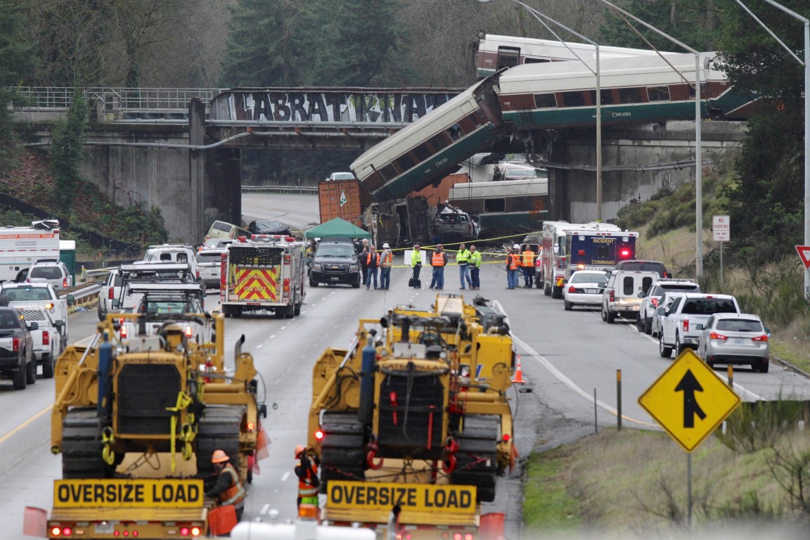 Rescue workers at the scene of the accident. Photo Reuters
