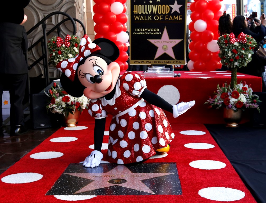 Minnie Mouse poses on her star after it was unveiled on the Hollywood Walk of Fame in Los Angeles...