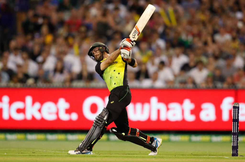 Australia's Glenn Maxwell clubs a six on his way to a score of 39 against England. Photo Getty