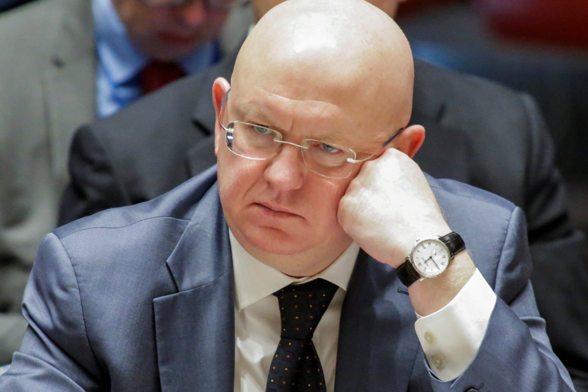 Russian Ambassador to the United Nations Vasily Nebenzya listens to members of the United Nations...