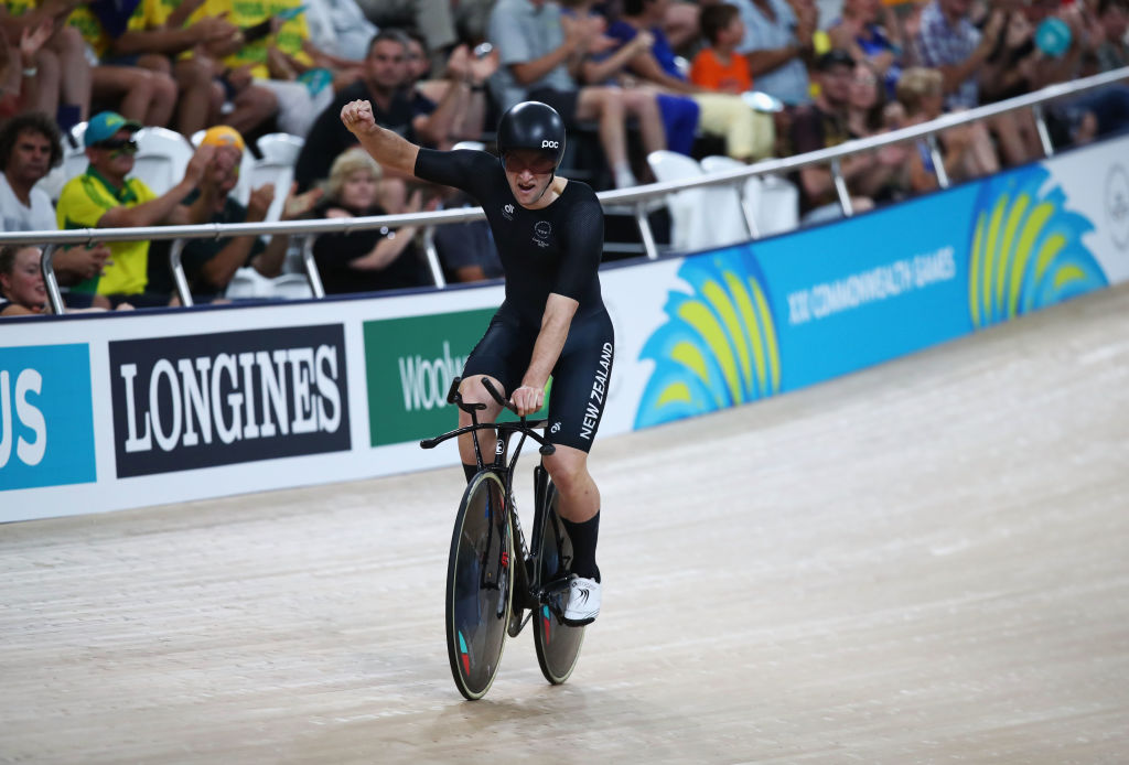 Dylan Kennett celebrates setting a Commonwealth Games record during the Men's 4000m Individual...