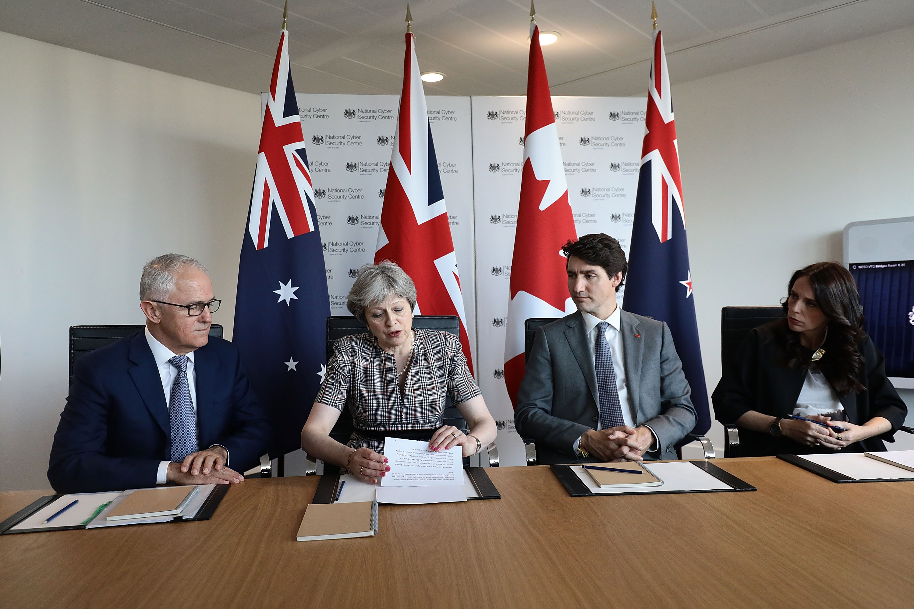 From left: Malcolm Turnbull, Theresa May, Justin Trudeau and Jacinda Ardern attend a meeting at...