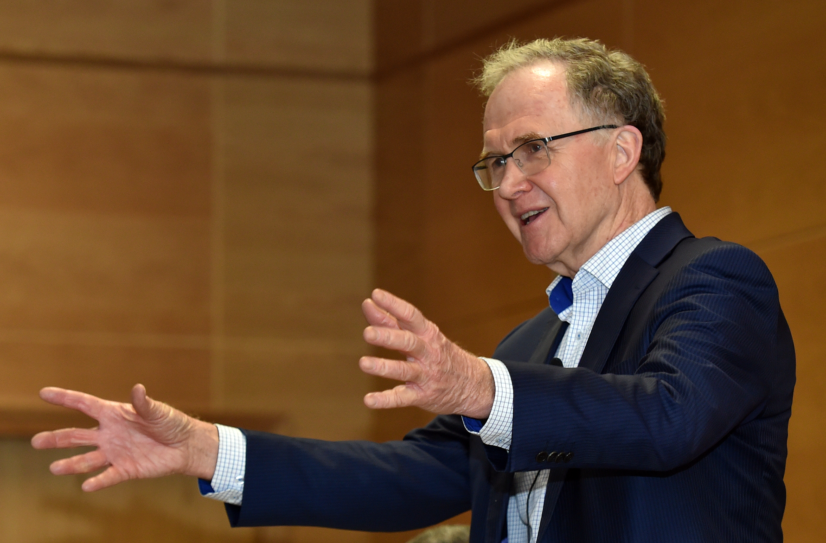 Mental health and addiction inquiry chairman Ron Paterson welcomes people to the inquiry’s public meeting in Dunedin last night. Photo: Peter McIntosh