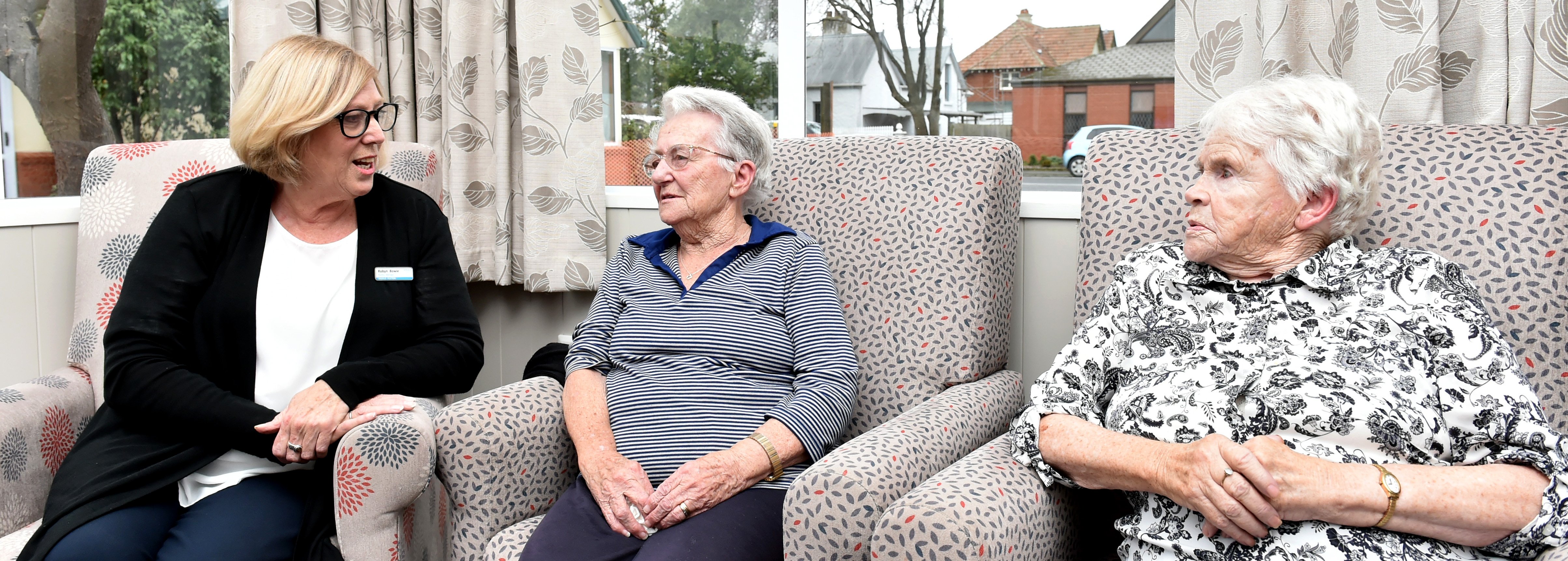 Radius Fulton Caversham facility manager Robyn Bowie catches up with residents Joyce Le Masurier...