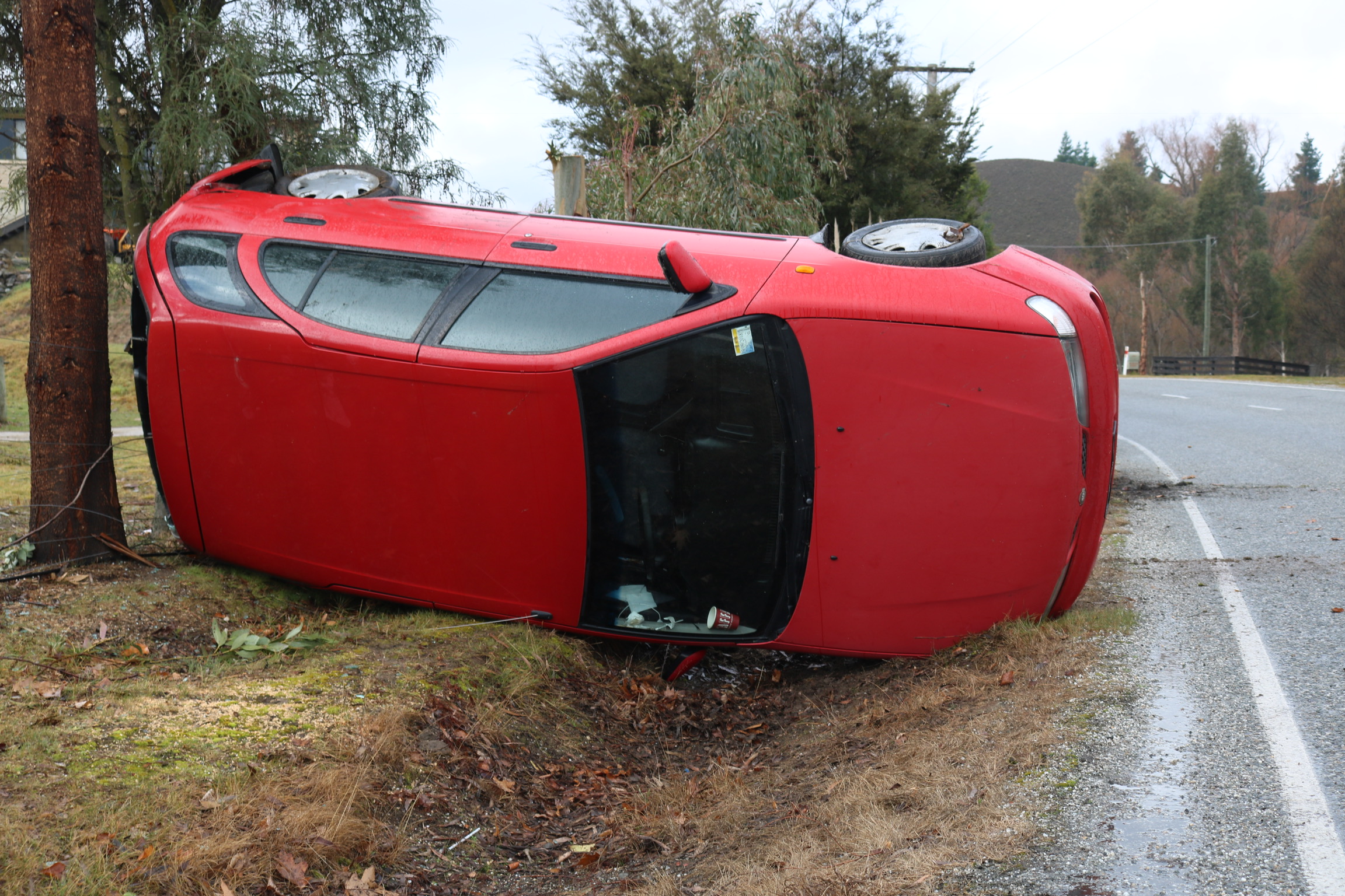 A car flipped on Springvale Rd near Alexandra this morning. Photo: Tom Kitchin