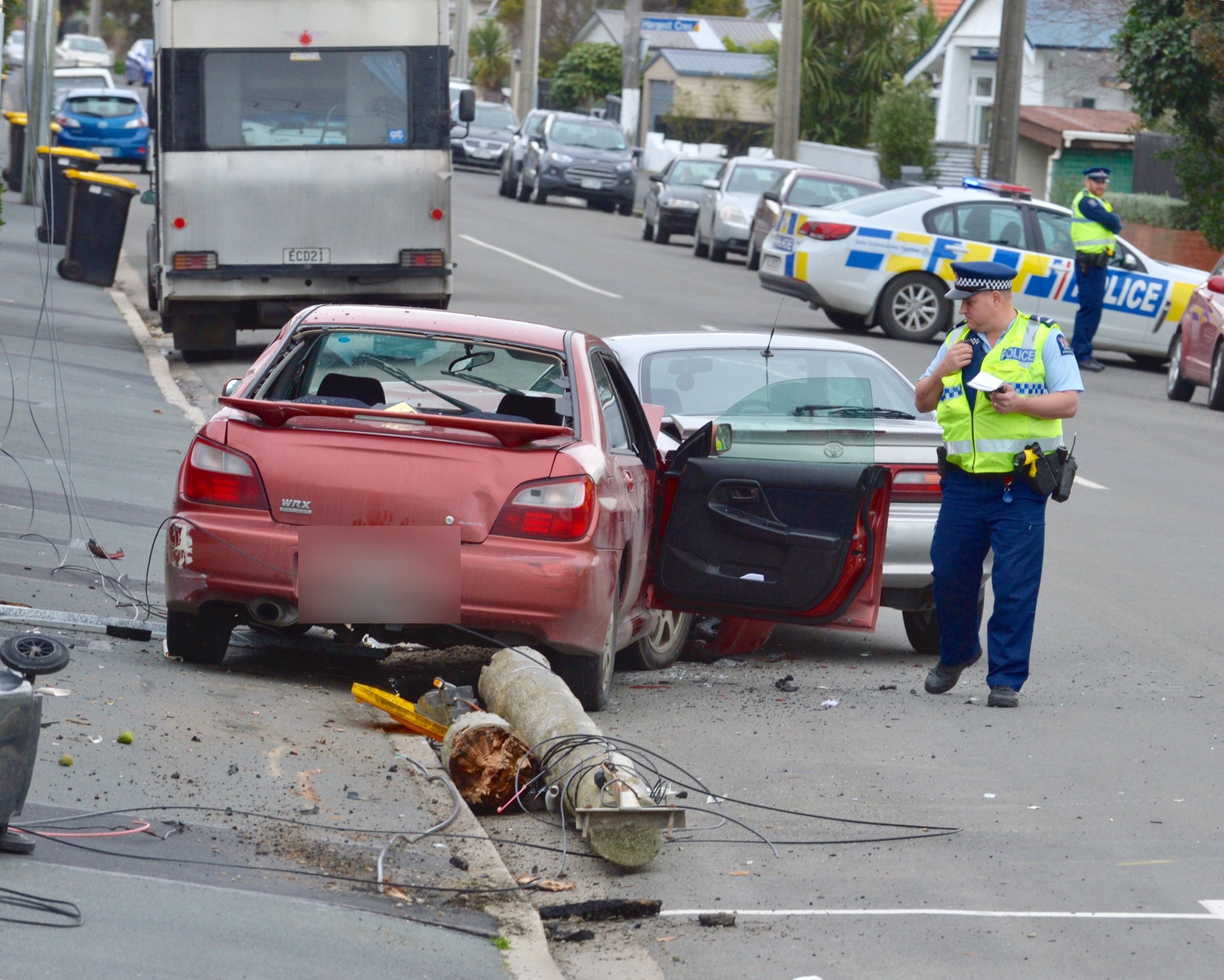 Emergency services attend a crash in Victoria Rd. Photo: Gerard O'Brien