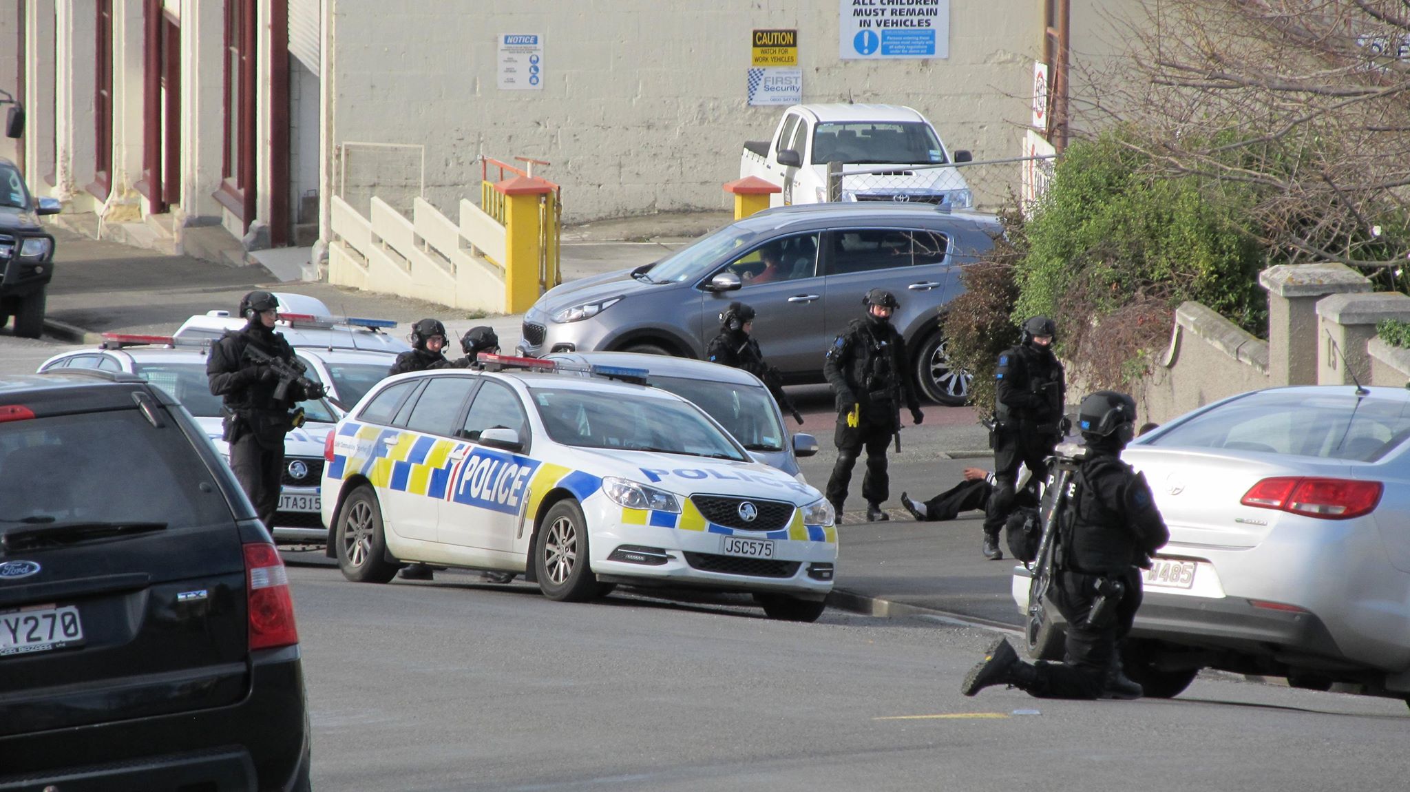 The armed offenders squad in Wansbeck St, Oamaru this afternoon. Photo: Supplied