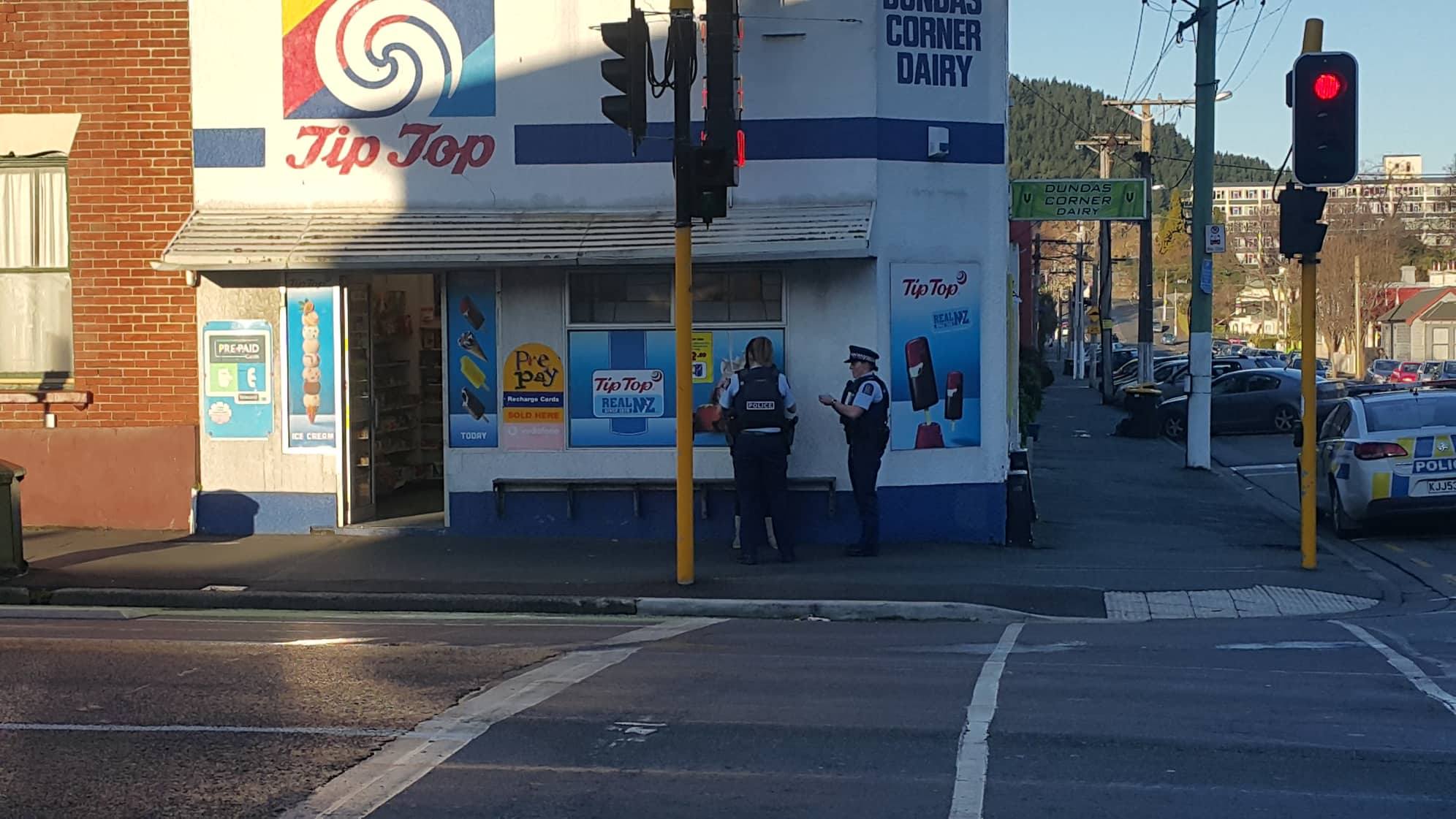 Police outside Dundas Corner Dairy following the alleged robbery attempt last week. Photo: George...