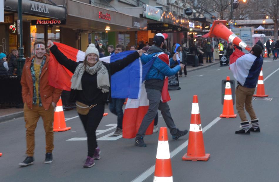 French supporters make their way noisily down Stuart St on their way to the match in June. Photo:...