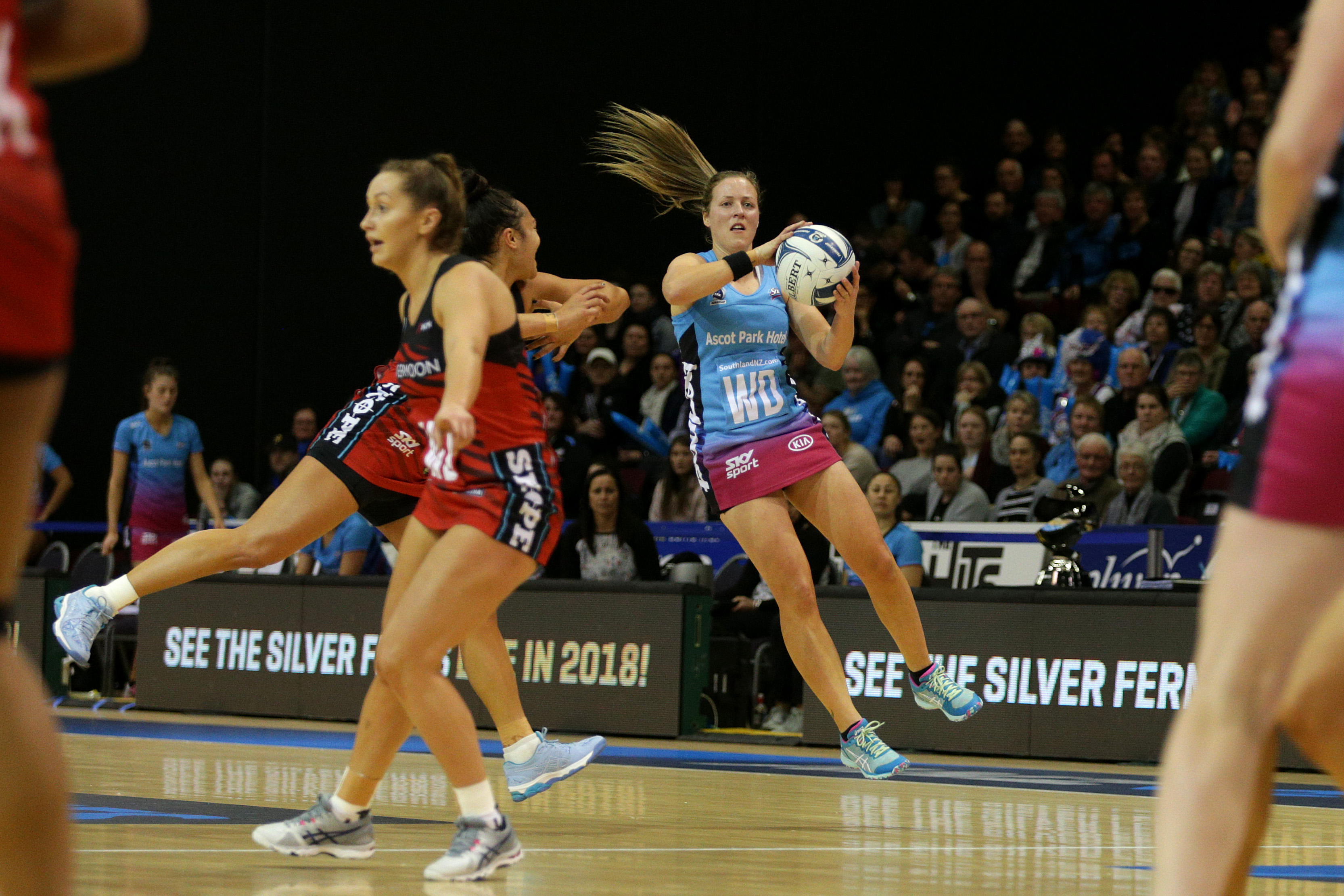 Southern Steel captain Wendy Frew receives a pass despite the attentions of Mainland Tactix wing attack Erikana Pedersen during the ANZ Premiership elimination final at ILT Stadium Southland in Invercargill last night. Tactix wing defence Charlotte Elley 