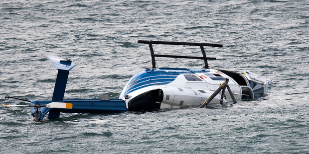 The crashed helicopter was salvaged this afternoon. Photo: NZ Herald