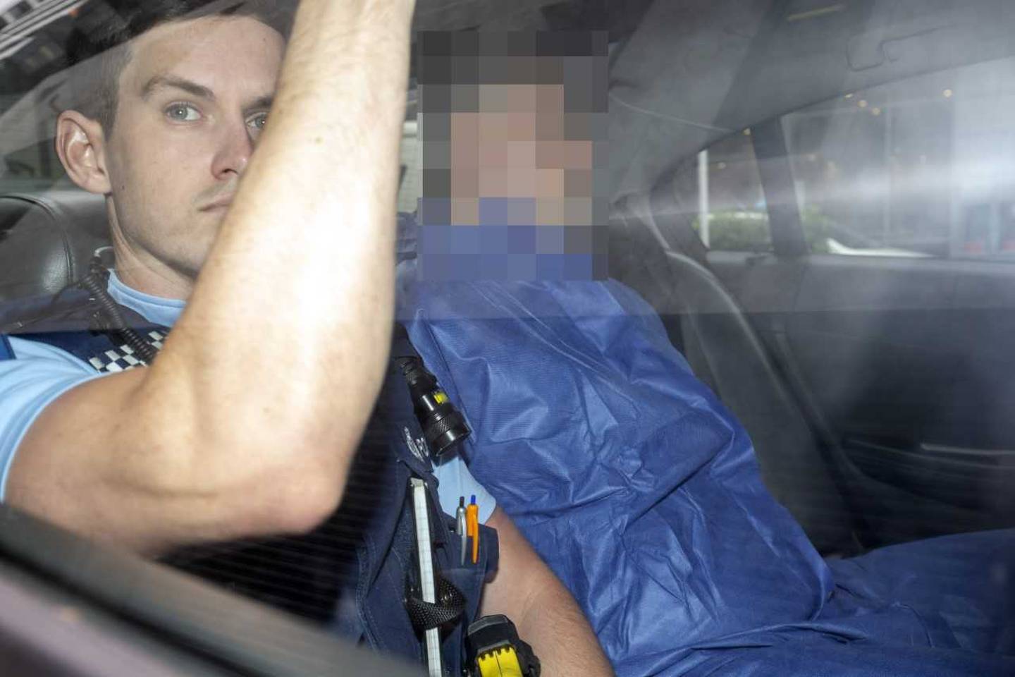 The man accused of murdering Grace Millane is driven to the Auckland District Court today. Photo:...