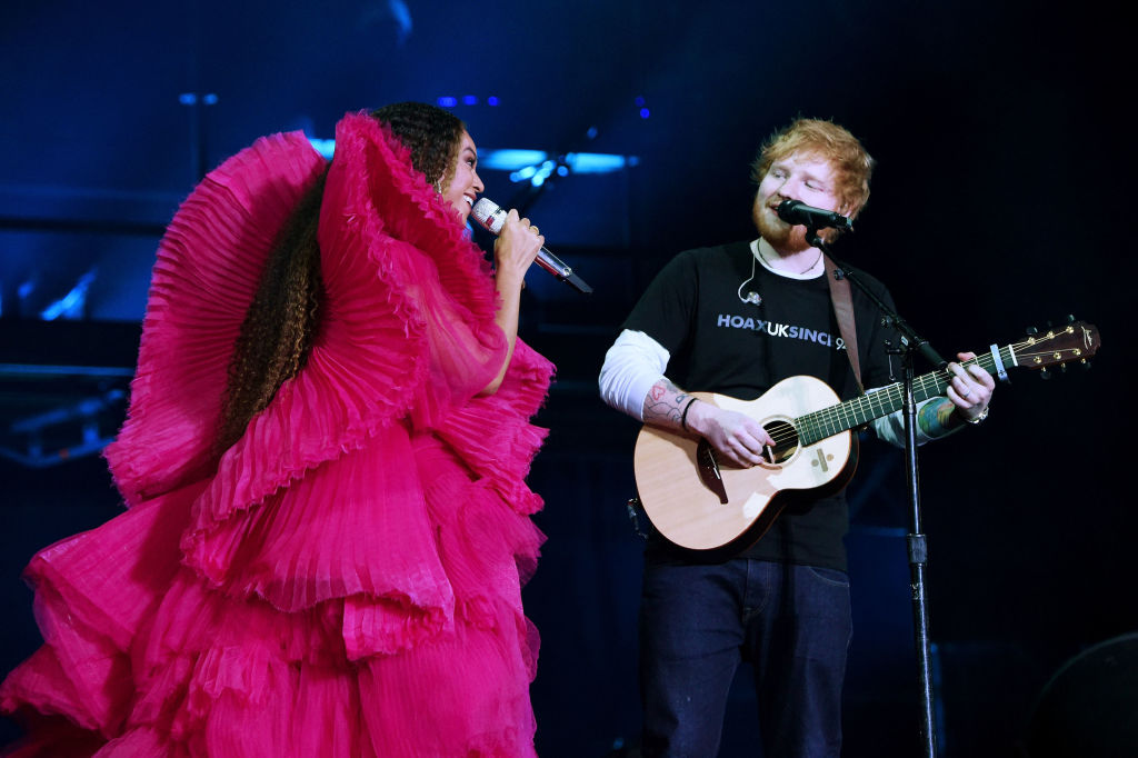 Beyonce and Ed Sheeran perform during the Global Citizen Festival: Mandela 100 at FNB Stadium in...