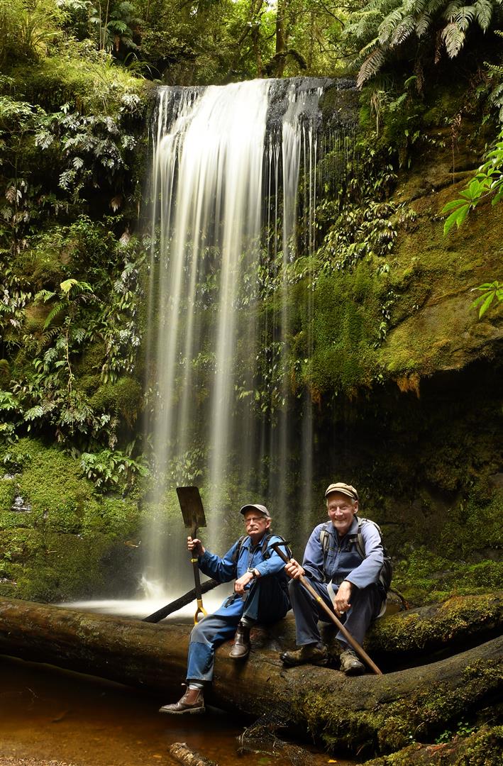 Catlins crib-owners Wayne Allen (left), and Peter Hill, who have been picking away at a ``forgotten'' waterfall trail in the Catlins for several years. Photo: Stephen Jaquiery