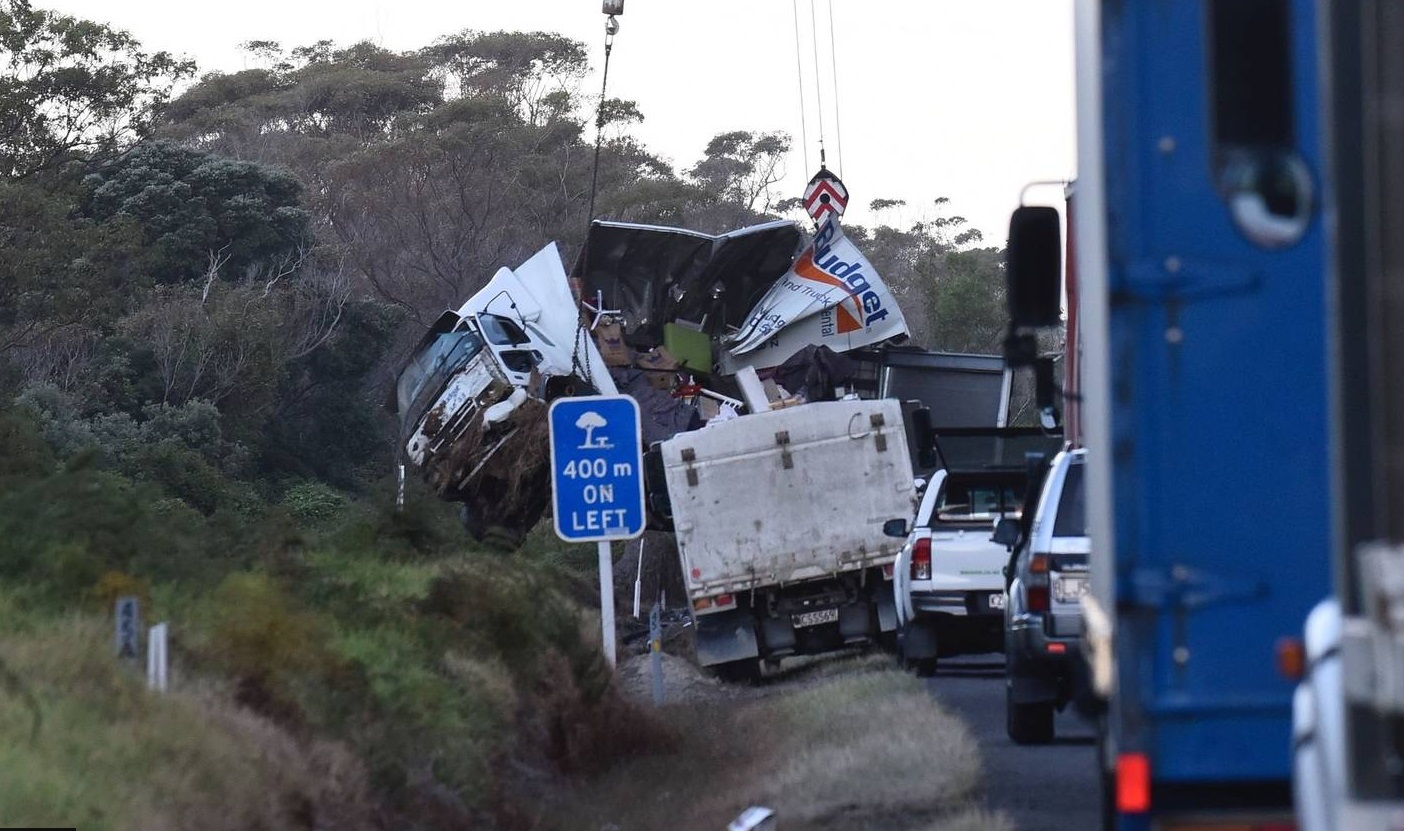 Rescue Helicopter pilot Todd Dunham said one truck was left peeled open like a can of sardines at...