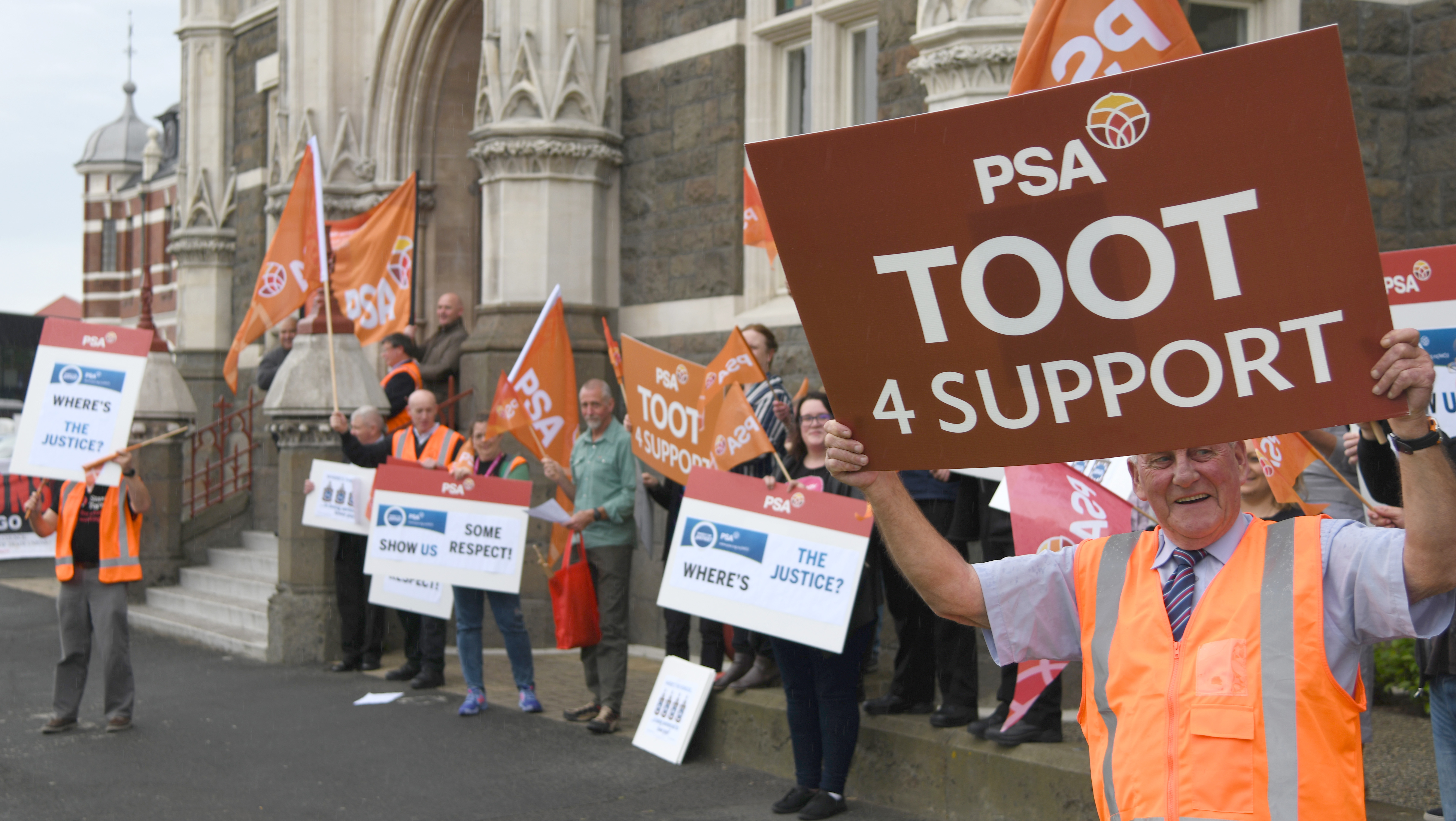 Dunedin District Court staffer Dave Pegg protests along with other court workers, lawyers, and...