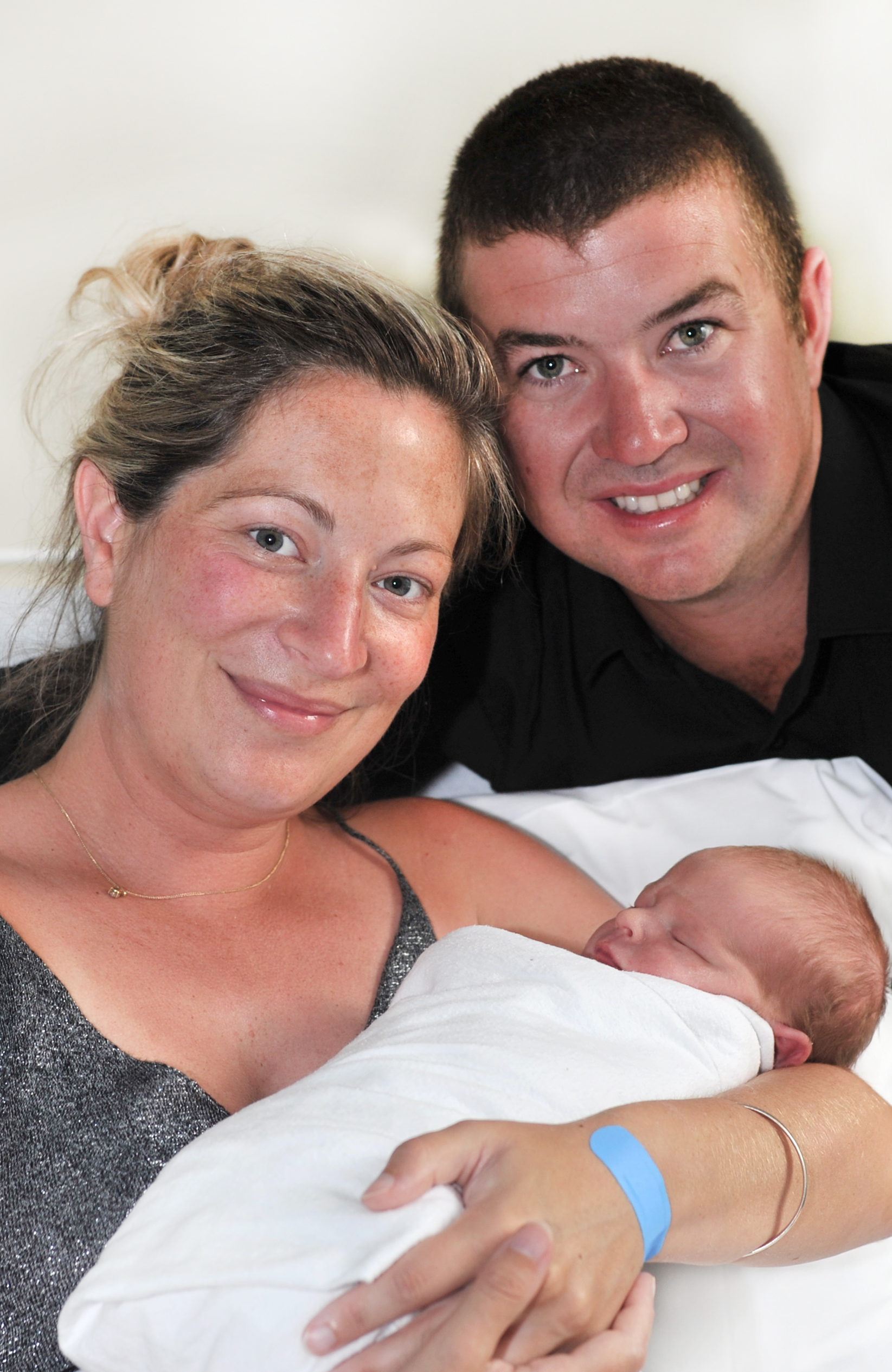 Proud parents Brad and Hannah Barrow, of Wanaka, hold their happy and healthy baby boy Lincoln...