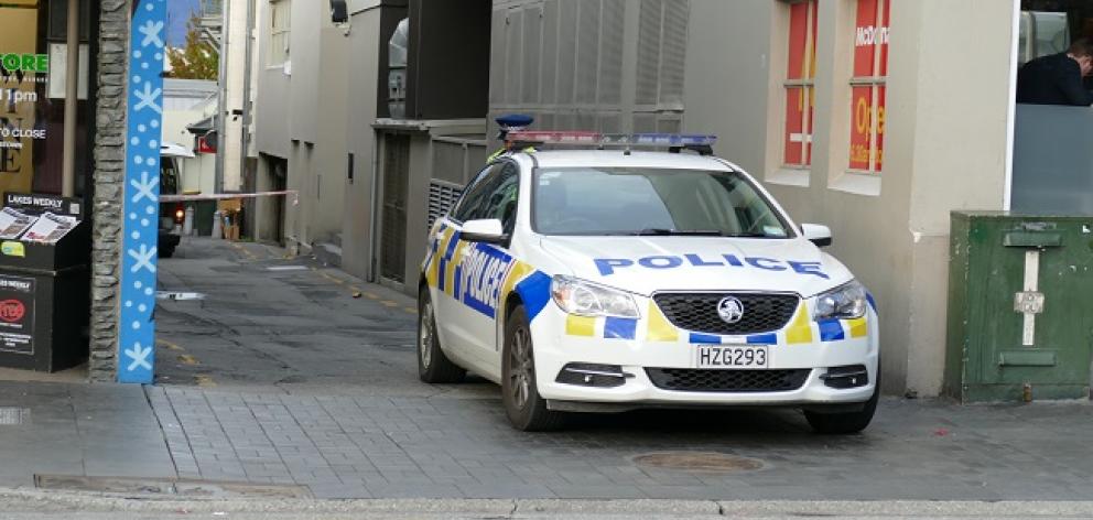 A police car at the scene in Cow Lane after the incident. Photo: Daisy Hudson