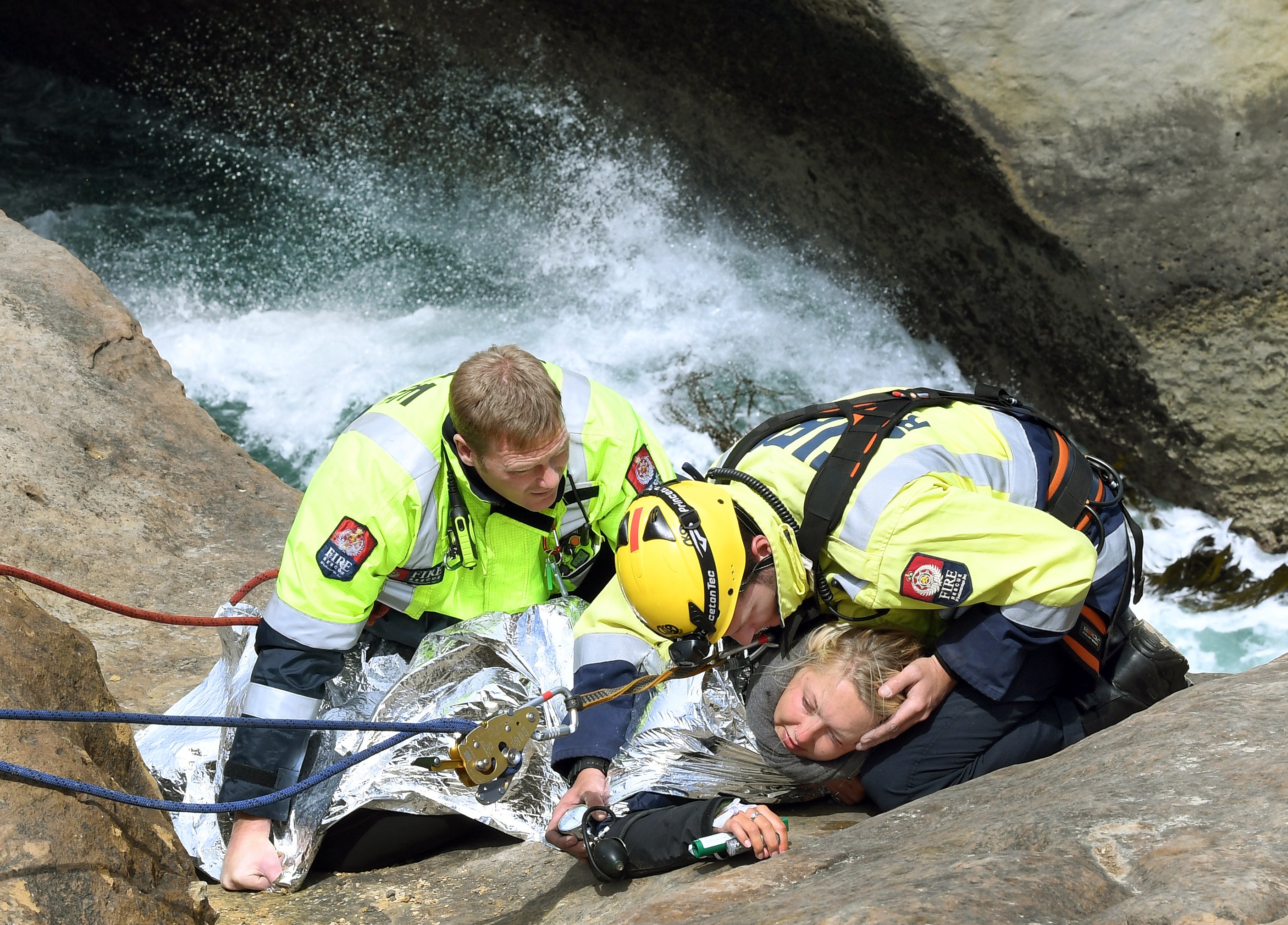 Stephen Jaquiery’s award-winning photograph of a tourist being rescued after a slide down a cliff...