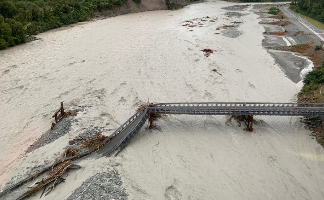 The Waiho Bridge was washed away in floodwaters on Tuesday. Photo: Doc

