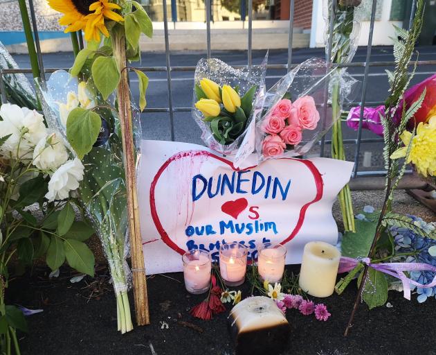 Flowers left outside the Dunedin mosque after the Christchurch shootings. Photo: Vaughan Elder