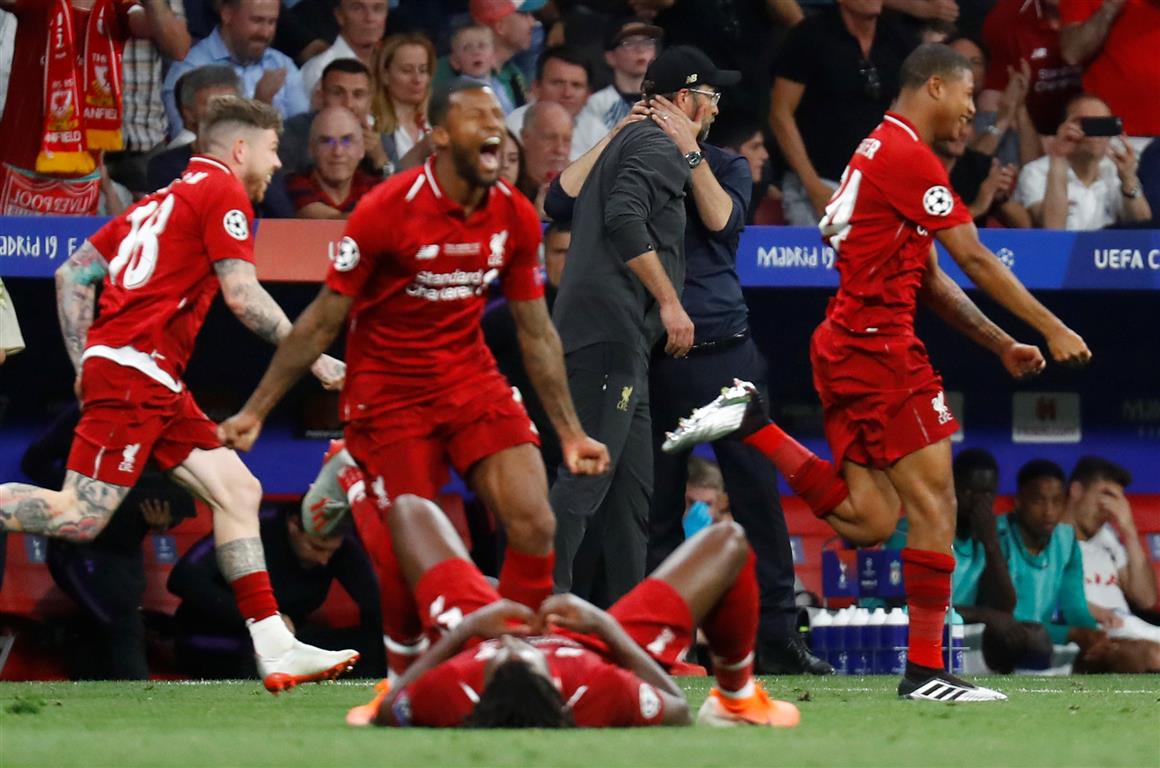 Liverpool players celebrate their victory. Photo: Reuters