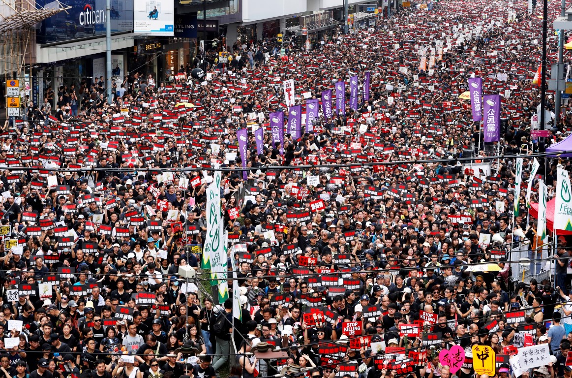 Protesters turned out in huge numbers in Hong Kong to demand the leaders step down and withdraw...