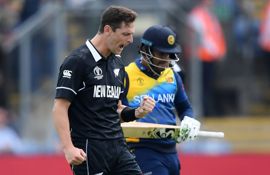 New Zealand's Matt Henry (L) celebrates taking the wicket of Sri Lanka's Kusal Perera. Photo: Getty