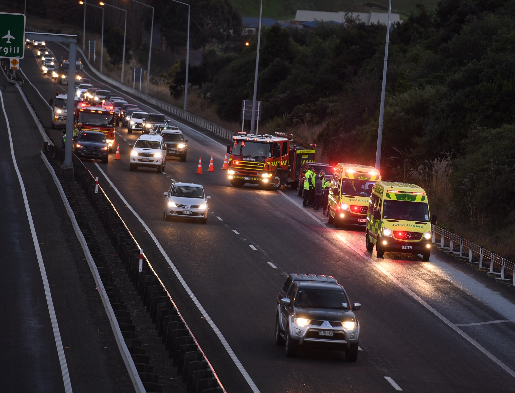 Emergency services at the scene of the crash on the motorway. Photo: Stephen Jaquiery