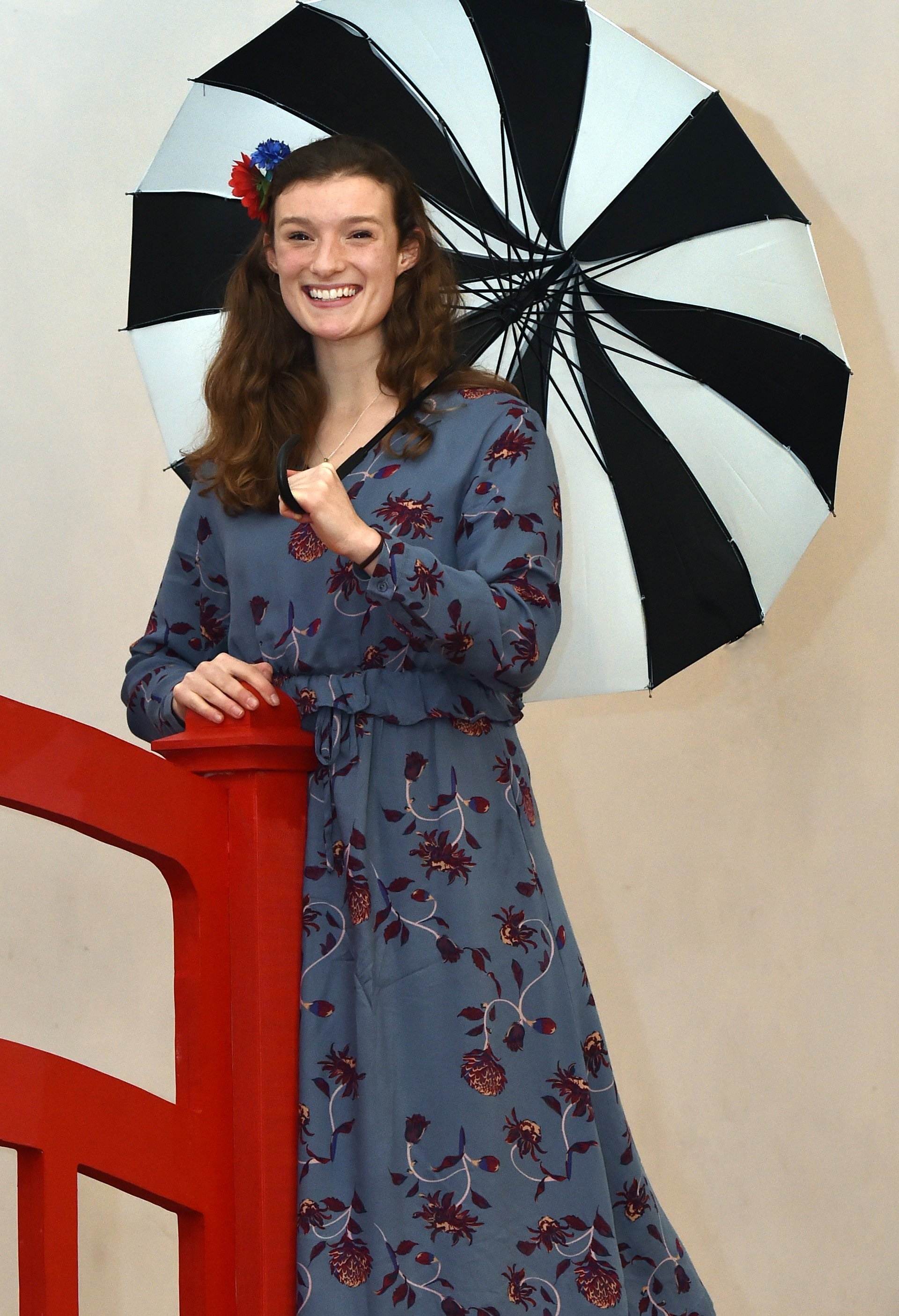 Kristina Saul  practises with her umbrella for her role in The Mikado. Photo: Peter McIntosh