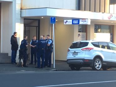 Police at the scene in Filleul St this morning. Photo: George Block 