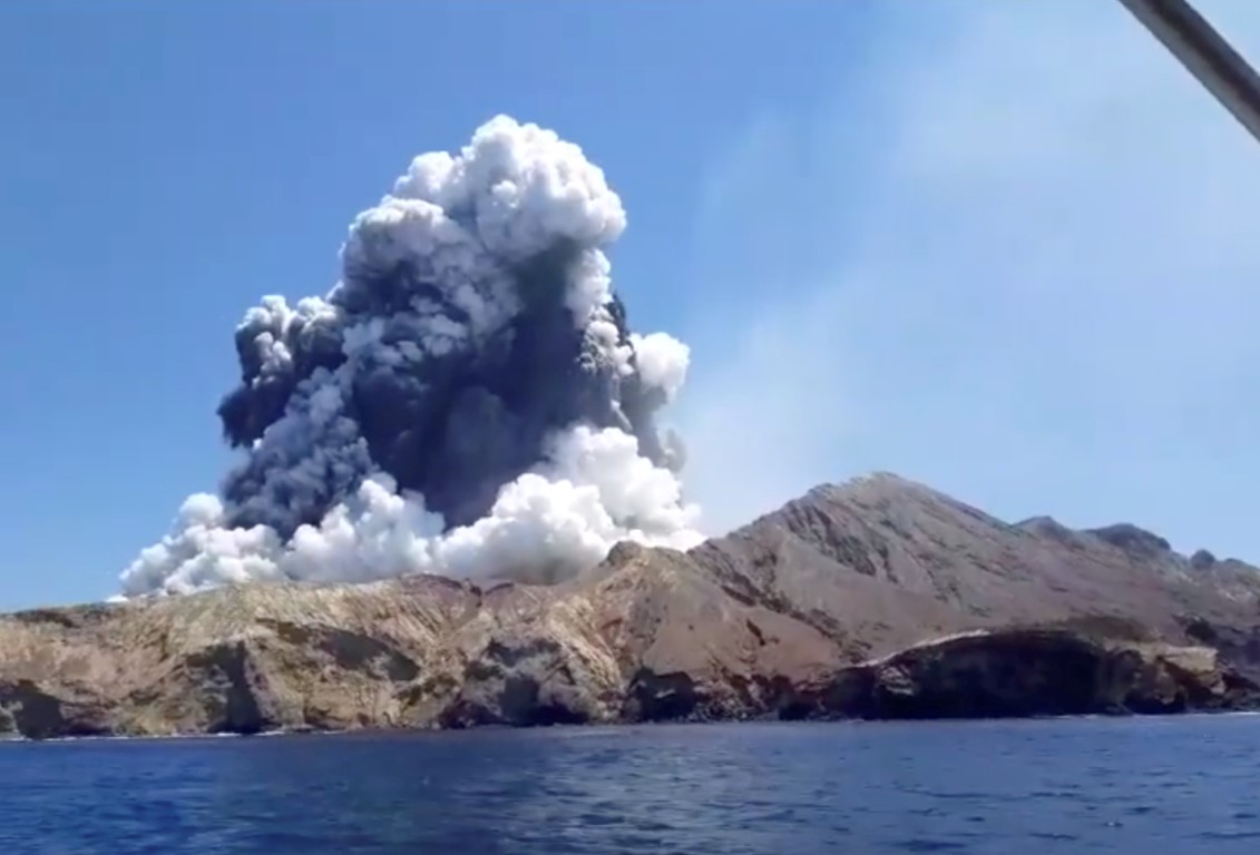 The eruption is seen from a boat near the island. Photo: INSTAGRAM @ALLESSANDROKAUFFMANN/via REUTERS