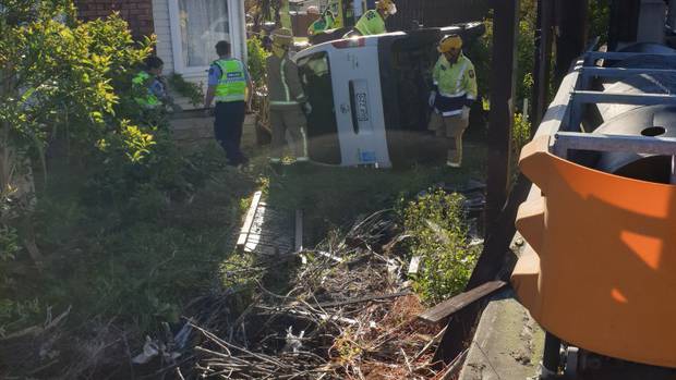 The van smashed through Irsaan Khan's fence in New Windsor and almost hit his house. Photo: supplied