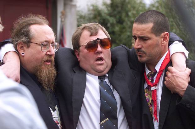 Mark Lundy being supported after the funeral of his wife Christine and daughter Amber in 2000....