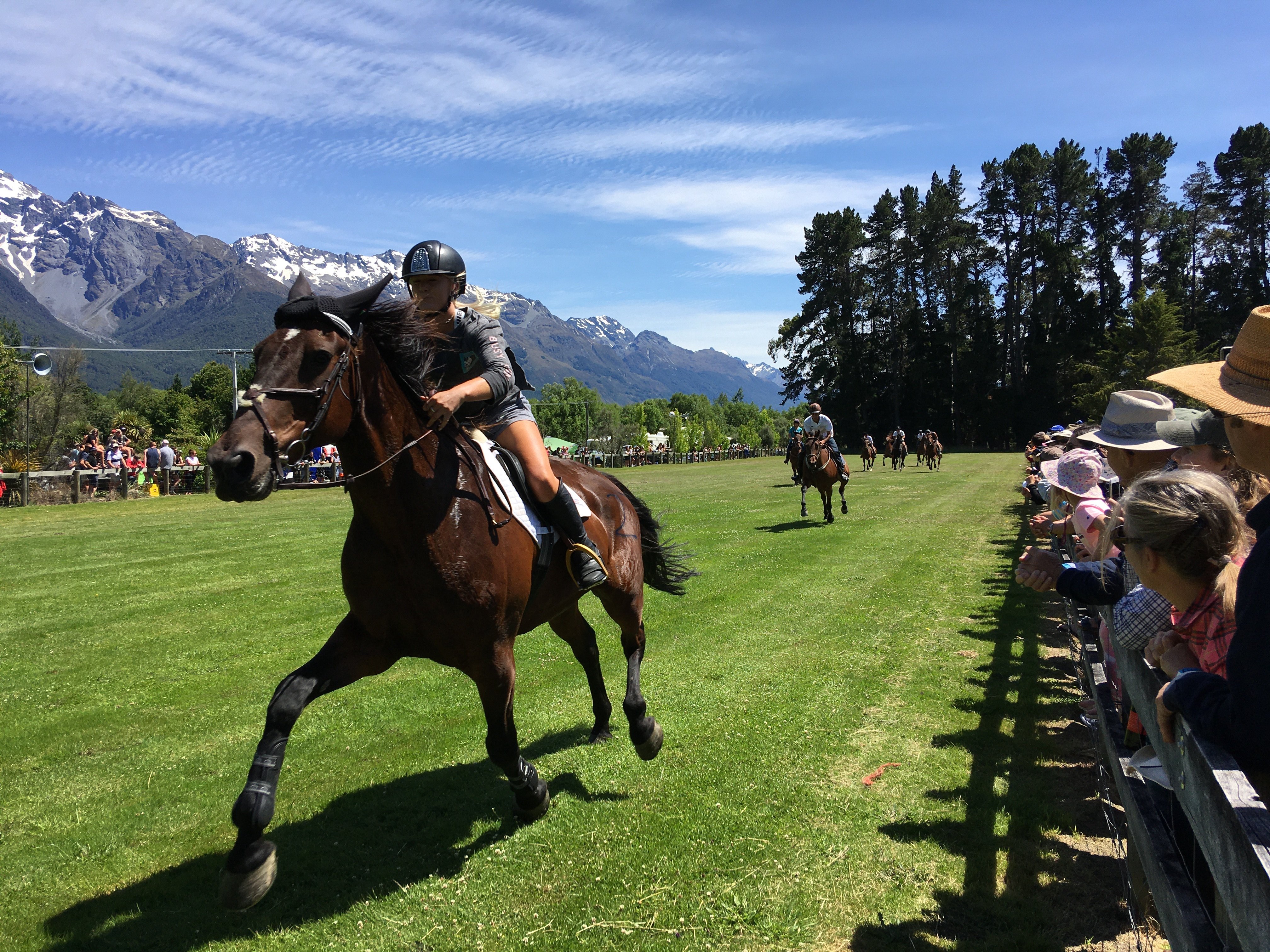 Grace Percy, of Glenorchy, riding Taz, on their way to winning the Trotting Cup at the Glenorchy...