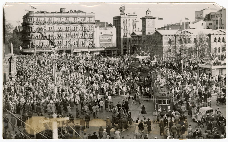 Crowds in Cathedral Square in the 1930s start to head home after watching a procession. Some wait...